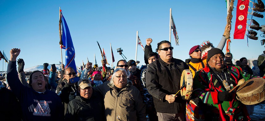 Protesters march at Oceti Sakowin camp where people have gathered to protest the Dakota Access oil pipeline in Cannon Ball, N.D. in December.