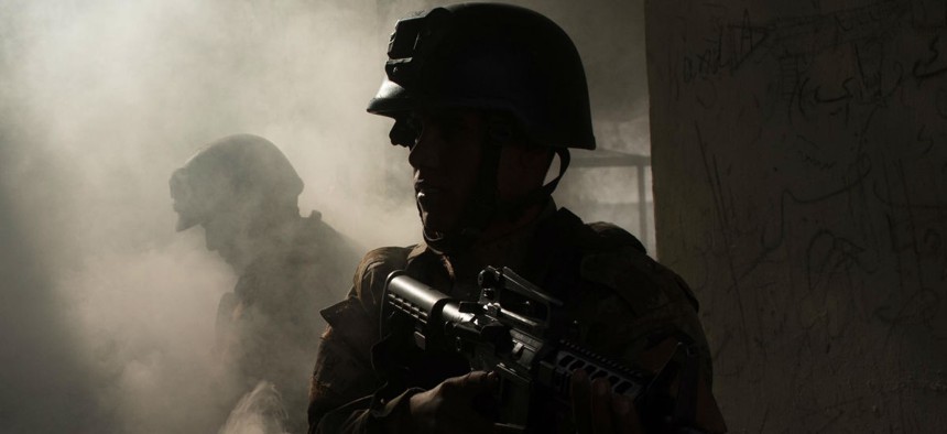 Iraqi Counter-Terrorism Service soldiers coordinate to tactically enter and clear rooms during an urban operation terrain exercise near Baghdad, Iraq. 