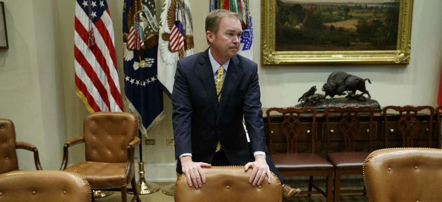 Budget Director Mick Mulvaney waits for the start of a meeting on the Federal budget with President Donald Trump on Feb. 22.