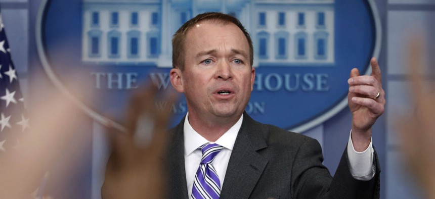OMB Director Mick Mulvaney speaks to reporters Monday. Lawmakers will have a hard time enacting the cuts proposed by Mulvaney and Trump, observer predicts. 
