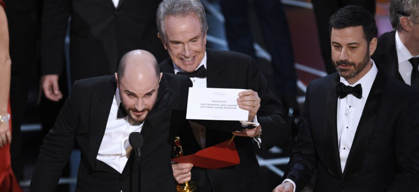 Jordan Horowitz, producer of "La La Land," shows the envelope revealing "Moonlight" as the true winner of best picture at the Oscars on Sunday, Feb. 26.