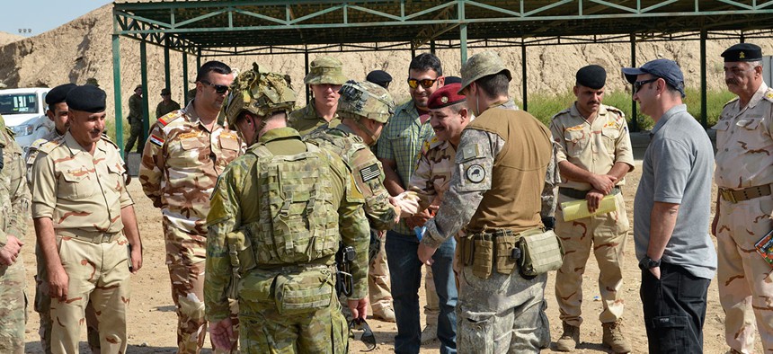 Command Sgt. Maj Benjamin Jones, Combined Joint Task Force – Operation Inherent Resolve, visits Coalition troops at Camp Taji, Iraq, where Iraqi forces can be trained.