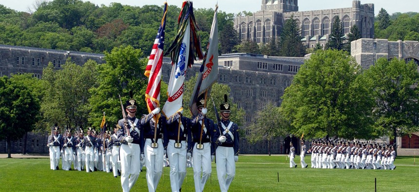 The cadets color guard walks on the West Point Campus in 2001.