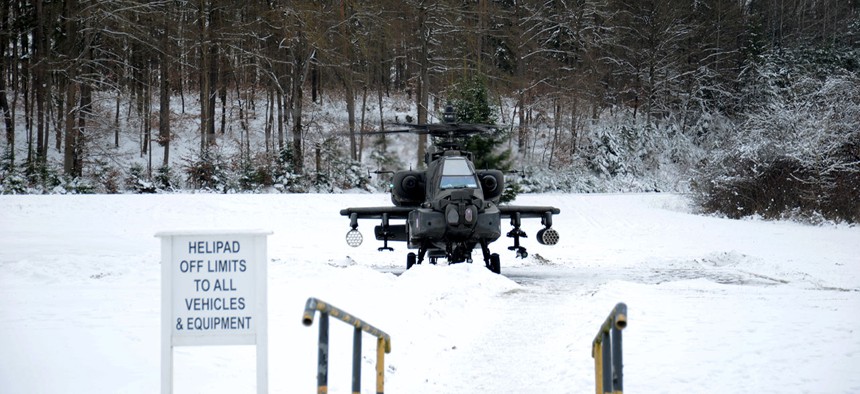 A Boeing AH 64D Apache Longbow attack helicopter crew initiates its first itinerary during the operation Dire Wolf at Grafenwoehr Training Area in Germany in January.