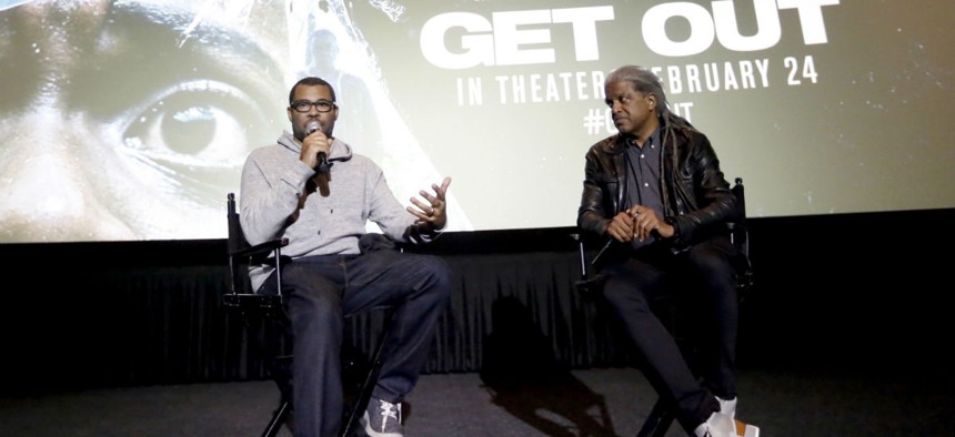 Director/Writer Jordan Peele and Elvis Mitchell attend a "Get Out" special screening question and answer session in February. 