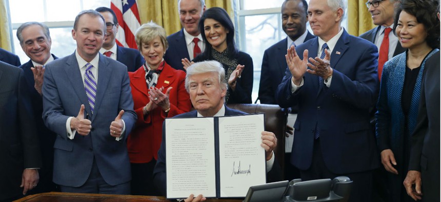 President Trump signed an executive order March 13 aimed at reforming the executive branch.