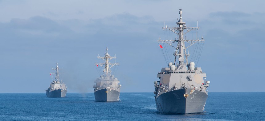 guided-missile destroyers USS Pinckney, USS Howard and USS Shoup steam in formation behind the guided-missile cruiser USS Princeton in March.