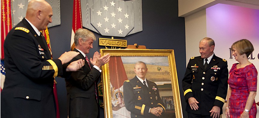 In 2012, then Army Chief of Staff Gen. Raymond Odierno; Secretary of the Army John McHugh; Gen. Martin Dempsey, chairman of the Joint Chiefs of Staff, and his wife, Deanie, look at Dempsey's portrait during a ceremony at the Pentagon.