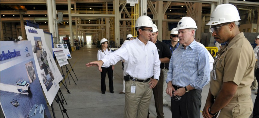 In 2009, then Navy Secretary Ray Mabus tours the Austal shipyards in Mobile, Ala., to view the progress of construction on the Navy littoral combat ships.