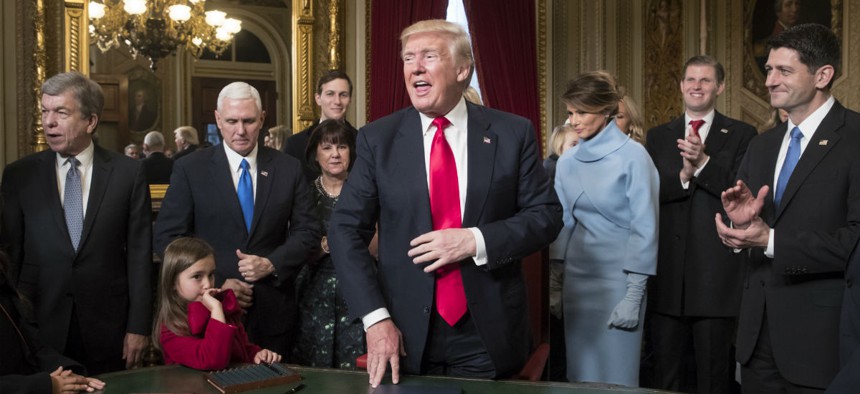 President Donald Trump is joined by the Congressional leadership and his family as he formally signs his cabinet nominations into law Jan. 20.