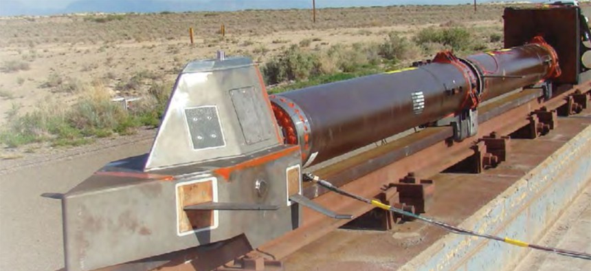 A monorail dry-run test at Holloman Air Force Base in July 2013 had no payload and used three representative carbon-epoxy panels mounted on the top and sides of the sled.