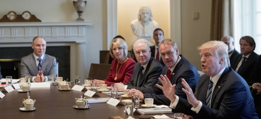 President Trump meets with his Cabinet in March. 