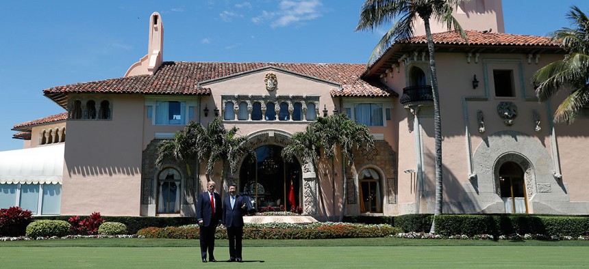 President Donald Trump and Chinese President Xi Jinping take photos at Mar-a-Lago on April 7.