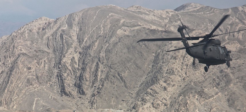 A UH-60 Black Hawk helicopter carrying leaders and advisers from Train, Advise, Assist Command - East, Resolute Support Mission, and Combined Security Transition Command-Afghanistan travels to the Nangarhar police Regional Logistics Center in 2015. 