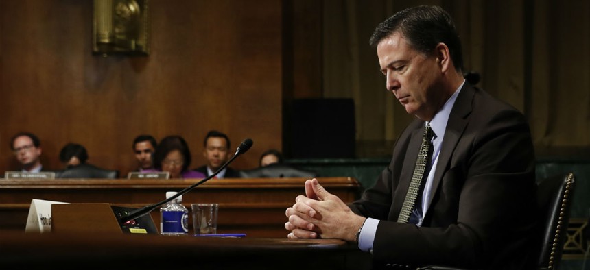Then-FBI Director James Comey testifies on May 3, six days before President Trump fired him. 