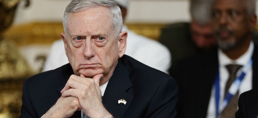 Secretary of Defense James Mattis listens during a National Security session at the 2017 Somalia Conference in London on May 11.
