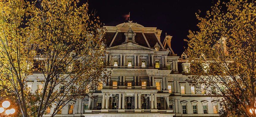 The Eisenhower Executive Office Building at night.