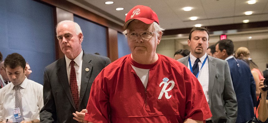 Rep. Joe Barton, with Rep. Pat Meehan (left) arrives on Capitol Hill Wednesday for a security briefing after a gunman opened fire at a congressional baseball practice in Alexandria, Virginia, wounding House Majority Whip Steve Scalise and others.