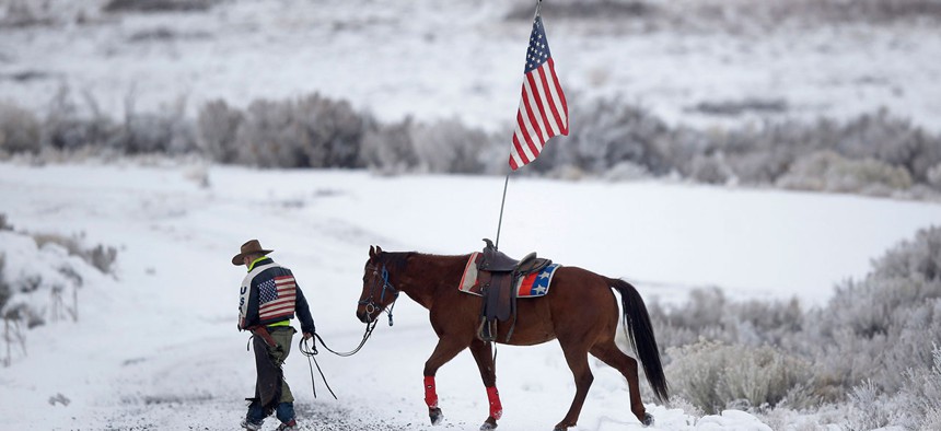 Duane Ehmer, an occupier of the Malheur Wildlife Refuge, walks his horse Hellboy on the site in October 2016.