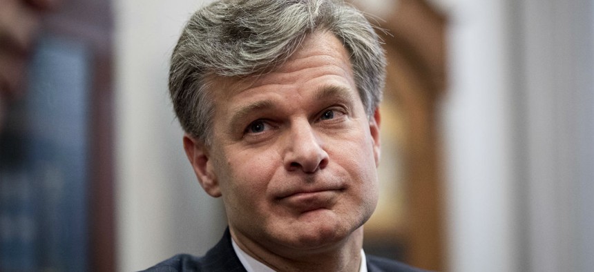 FBI Director nominee Christopher Wray meets with lawmakers on Capitol Hill in June.