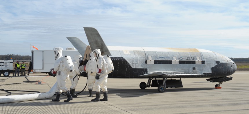   The X-37B Orbital Test Vehicle mission 3 (OTV-3), the Air Force's unmanned, reusable space plane, landed at Vandenberg Air Force Base in 2014.