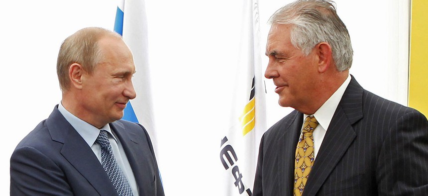 Putin and Tillerson shake hands in 2012.
