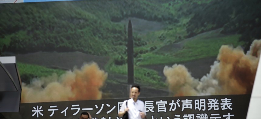 A public TV screen broadcasts a local TV news showing what was said to be the launch of a Hwasong-14 intercontinental ballistic missile, ICBM, aired by North Korea's KRT on July 4 in Tokyo.