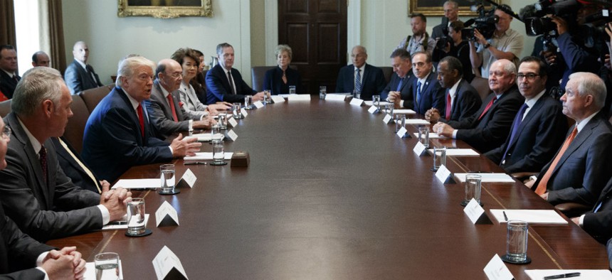 President Trump meets with his Cabinet at the White House Monday. 