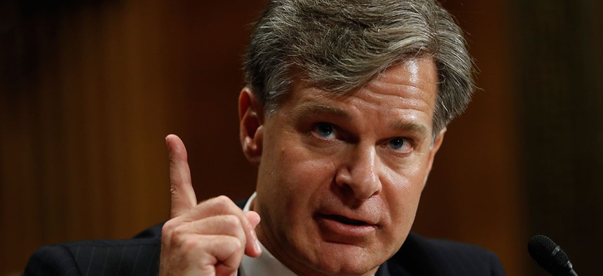 Christopher Wray testifies on Capitol Hill on July 12.