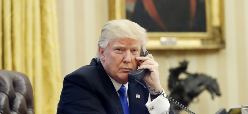 President Donald Trump speaks on the phone with Prime Minister of Australia Malcolm Turnbull on Jan. 28.