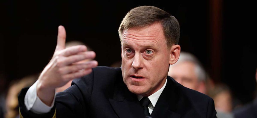 ational Security Agency director Adm. Mike Rogers speaks during a Senate Intelligence Committee hearing about the Foreign Intelligence Surveillance Act, on Capitol Hill in June.