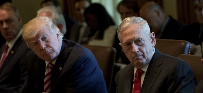 President Donald Trump and Defense Secretary Jim Mattis attend a Cabinet meeting June 12.