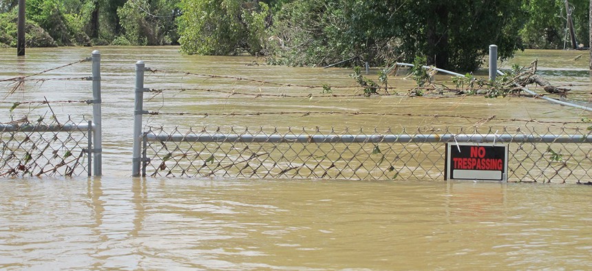 Highlands Acid Pit Superfund site in Texas. Normally, its toxic waste is cordoned off.