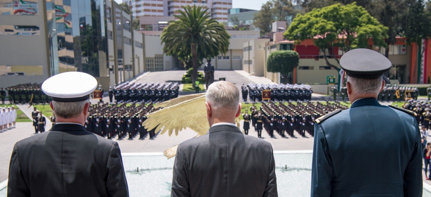 Secretary of Defense Jim Mattis stands with Gen. Salvador Cienfuegos Zepeda, Mexico’s secretary of national defense, during an armed forces parade in Mexico City on Sept. 15.