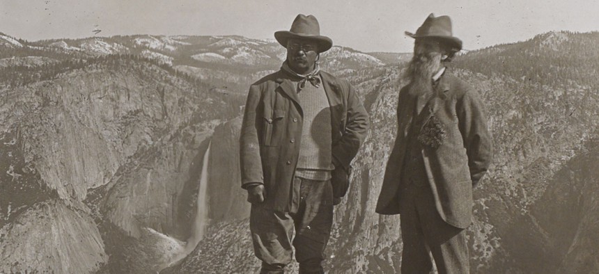 Theodore Roosevelt stands with John Muir on Glacier Point, above Yosemite Valley, California, in 1903.