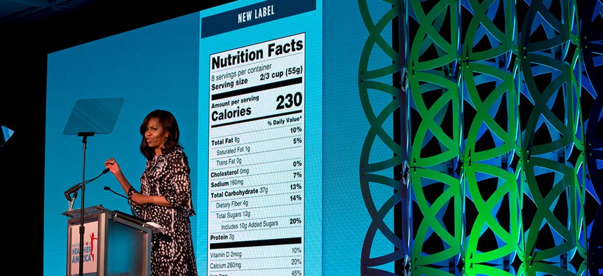 Michelle Obama announces a makeover for food nutrition labels with calories listed in bigger, bolder type and a new line for added sugars in Washington in 2016.