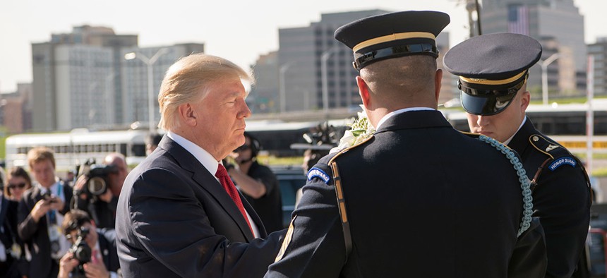 Donald Trump lays a wreath at the Pentagon Memorial before a 9/11 Observance Ceremony at the Pentagon.