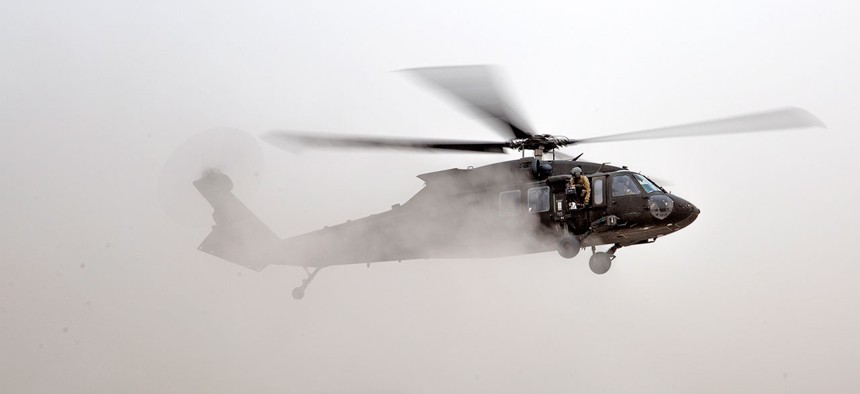  UH-60 Blackhawk helicopter lands during hot and cold load training in Iraq in October.