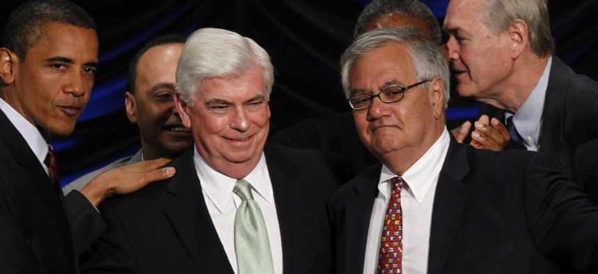 Then-President Obama stands with then-Sen. Chris Dodd, D-Conn. (left) and then-Rep. Barney Frank, D-Mass., in 2010 after the signing of the financial reform law that created CFPB. 