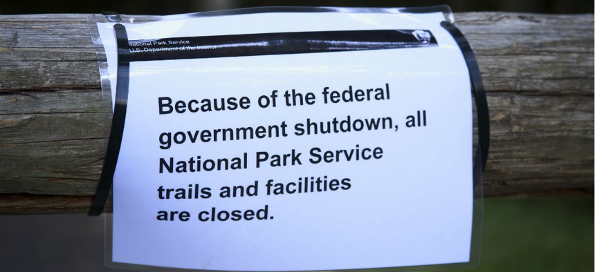 A sign posted at Mount Rainier National Park during the 2013 government shutdown alerts visitors to its closure.