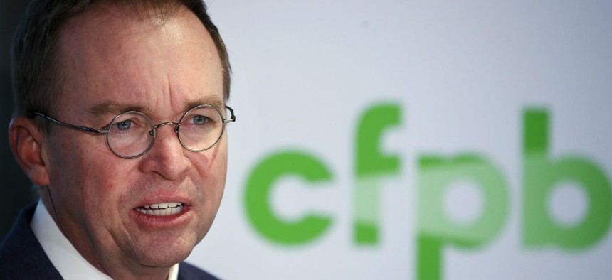 New CFPB Director Mick Mulvaney speaks during a news conference. 