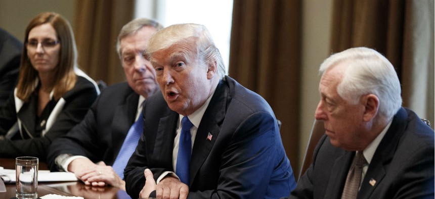 President Trump on Tuesday discussed immigration policy with lawmakers, including Rep. Martha McSally, R-Ariz., who said she would push for higher pay and more personnel. 