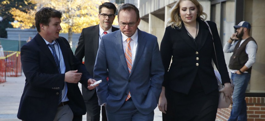 Mick Mulvaney arrives at the Consumer Financial Protection Bureau shortly after his controversial appointment. 
