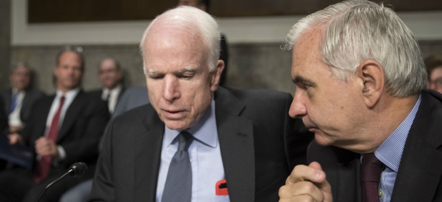 Sens. John McCain, R-Ariz., (left) and Jack Reed, D-R.I.,  championed the project.