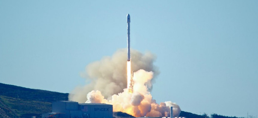Space-X's Falcon 9 rocket with 10 satellites launches at Vandenberg Air Force Base, Calif. on Saturday, Jan. 14, 2017. 