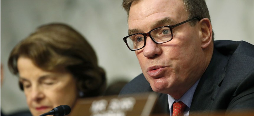 Sen. Mark Warner, D-Va., said the White House must prioritize improving the security clearance process in the coming months.