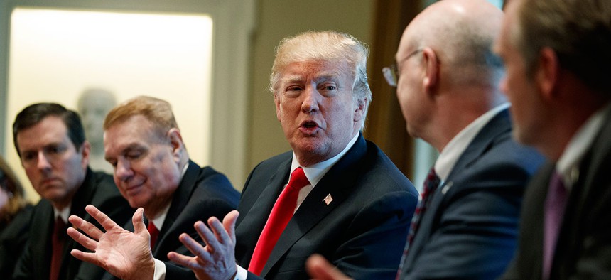 President Donald Trump speaks during a meeting with steel and aluminum executives in the Cabinet Room of the White House on March 1.