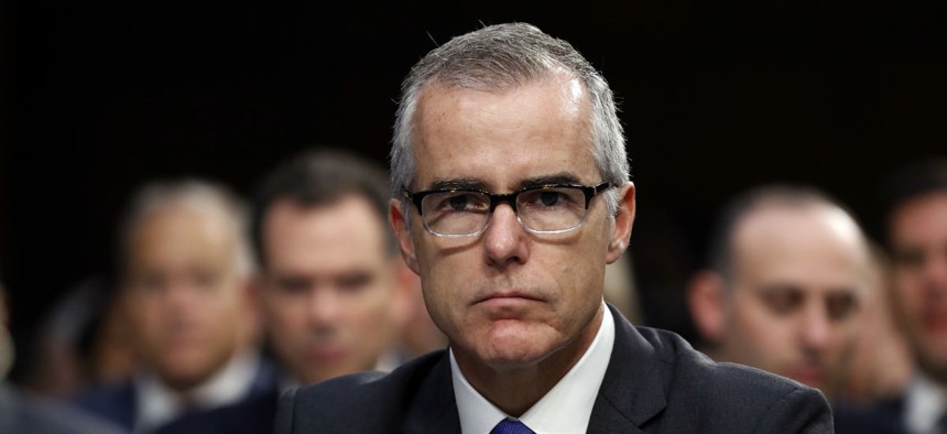 Then acting FBI Director Andrew McCabe testifies at a Senate Intelligence Committee hearing on Dec. 23, 2017.
