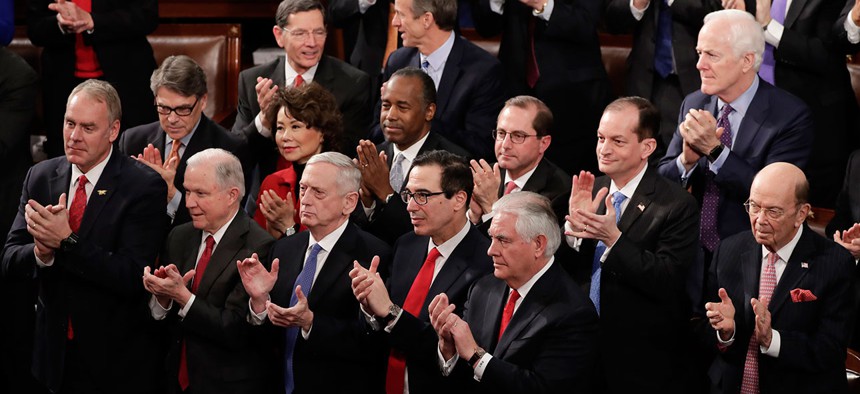 Members of Trump's Cabinet applaud during the State of the union in January.