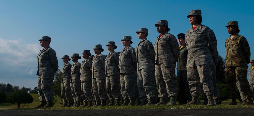 U.S. Air Force Airmen stand parade rest before a retreat ceremony in March.